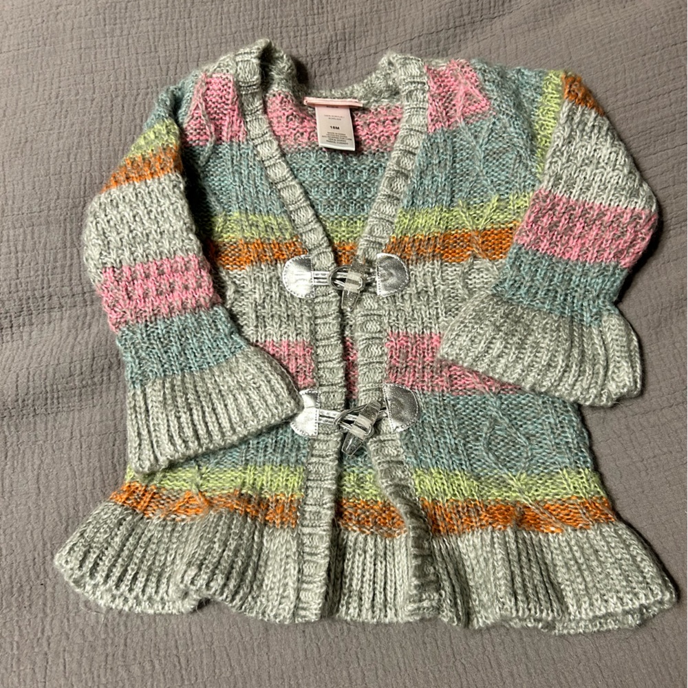 Adorable button up sweater. Hardly worn.